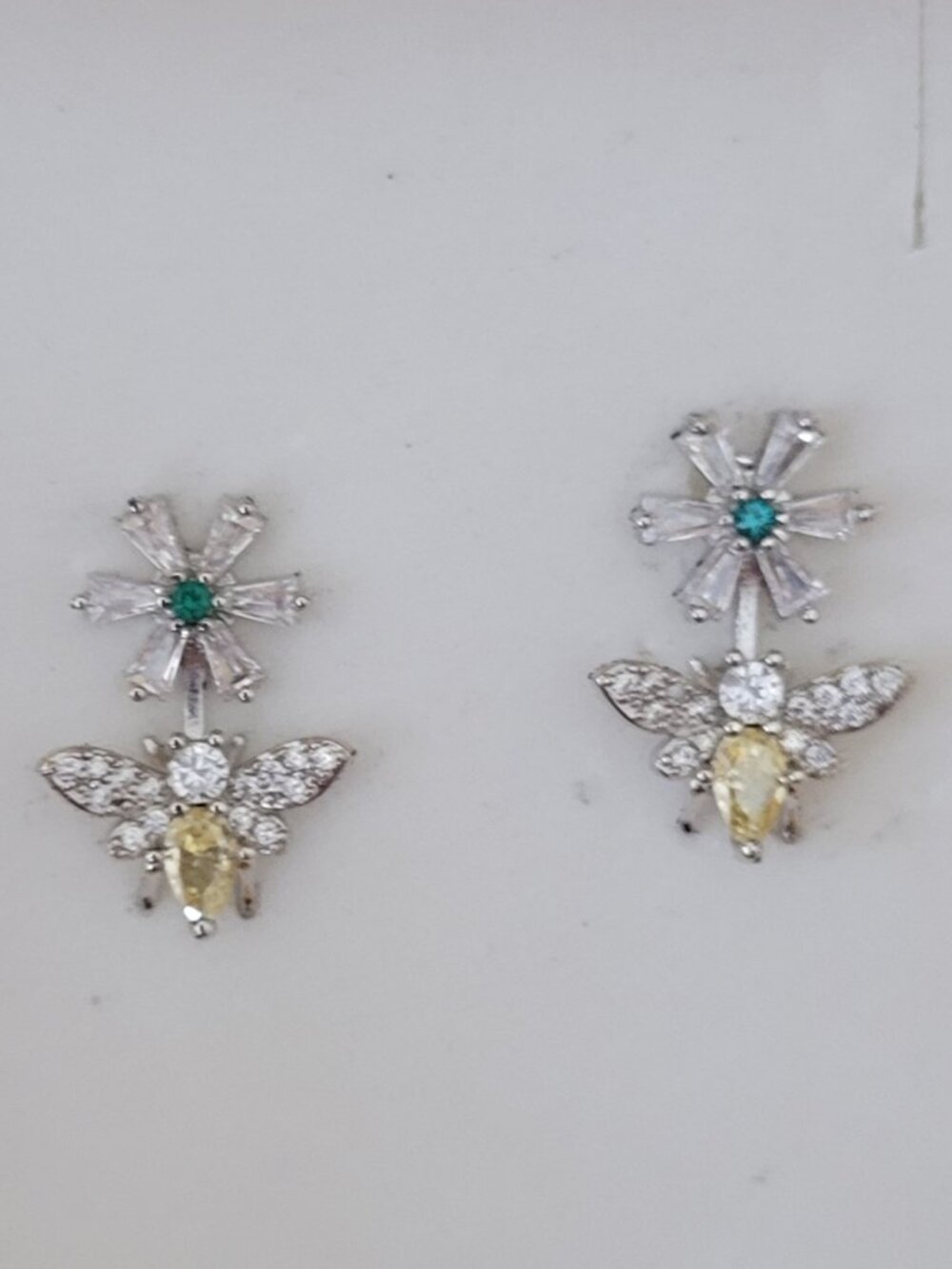 Busy Yellow Bees on Delicate Rhinestone Flower